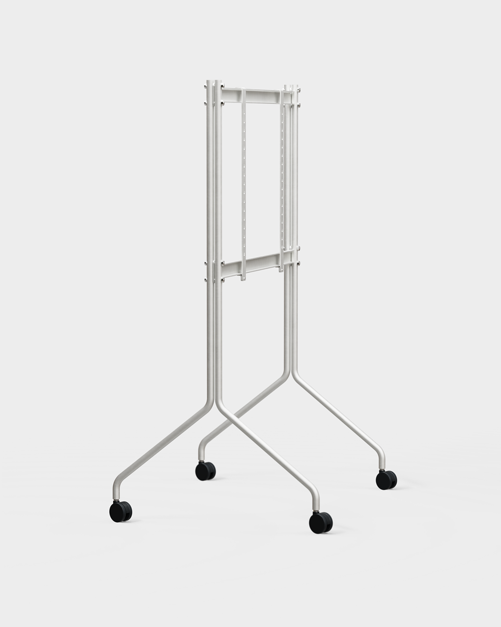 Moon Tall TV stand in Cloudy Silver, angled studio view with mounted screen, splayed legs and black caster wheels